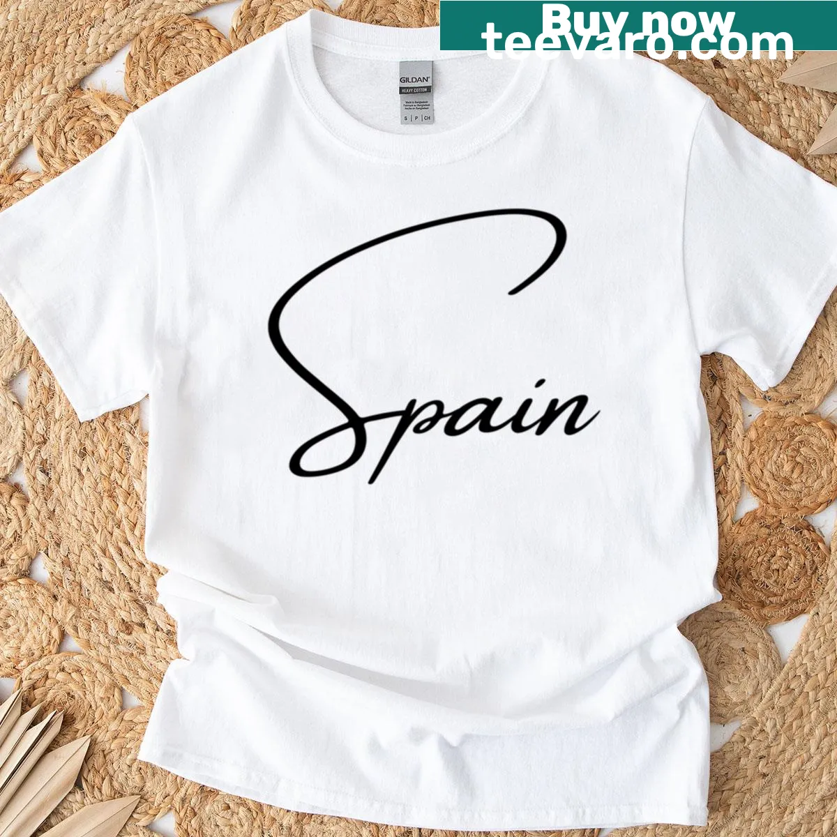 Whimsical Spain-themed T-shirt design featuring playful illustrations — on a men's t-shirt
