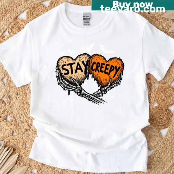 Skeleton hand reaching out from a dripping heart graphic