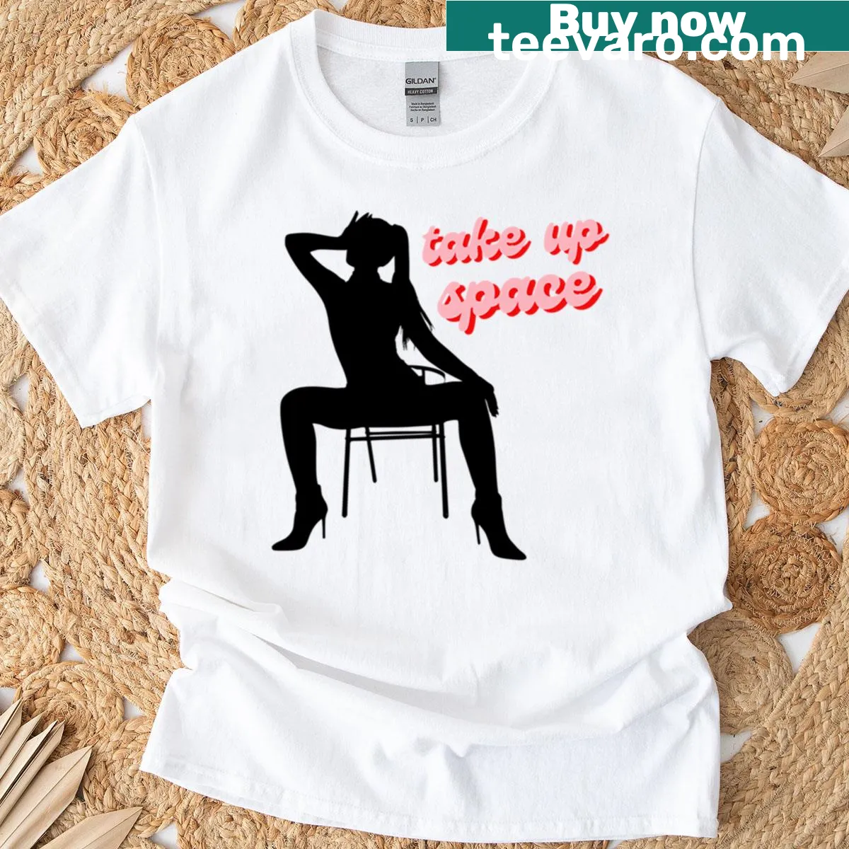 Bold silhouette of a woman in a dramatic pose with text — on a men's t-shirt
