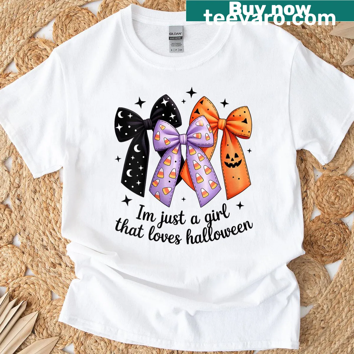 Whimsical Halloween-themed T-shirt with bows and candy corn design — on a men's t-shirt