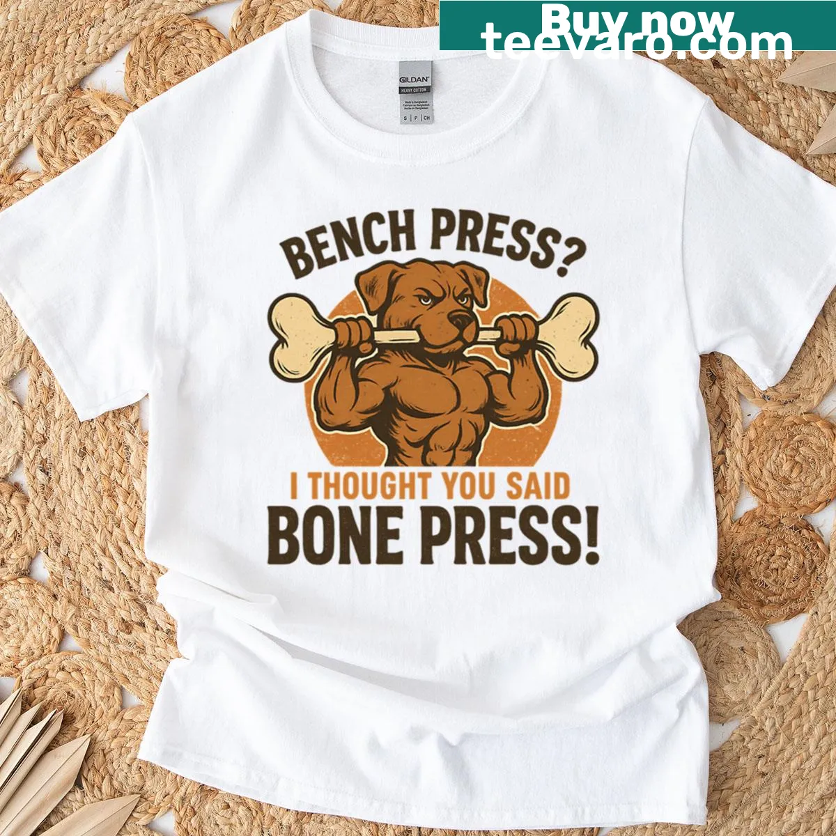 Funny gym shirt with a dog lifting a bone illustration — on a men's t-shirt