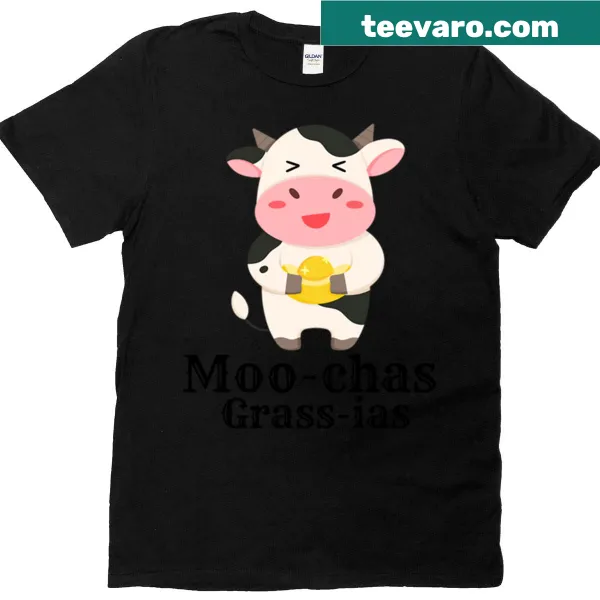 Funny T-shirt with the phrase 'Moo Chas Grass Ias Muchas Gracias' in playful typography