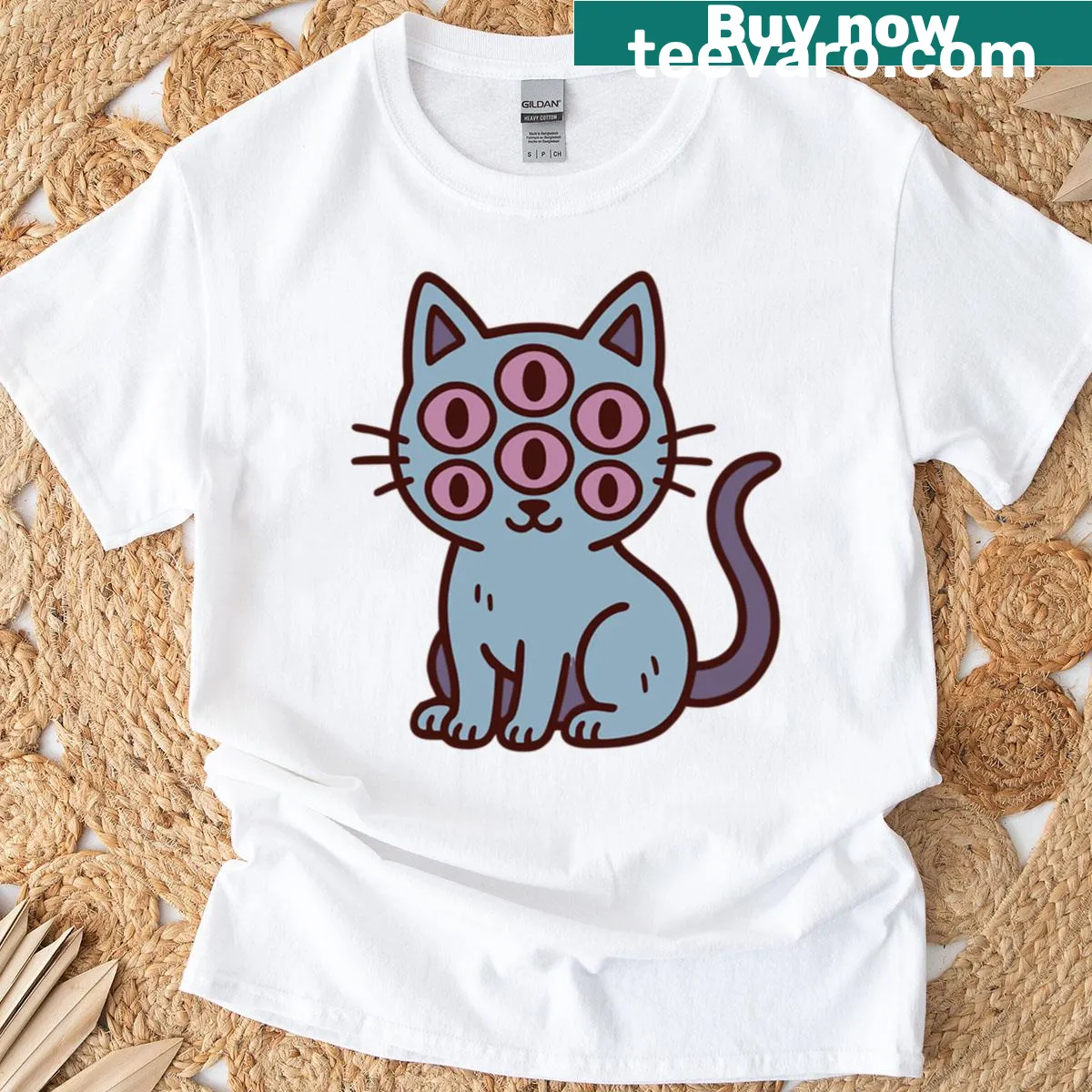 Whimsical six-eyed cat graphic on a cute T-shirt — on a men's t-shirt