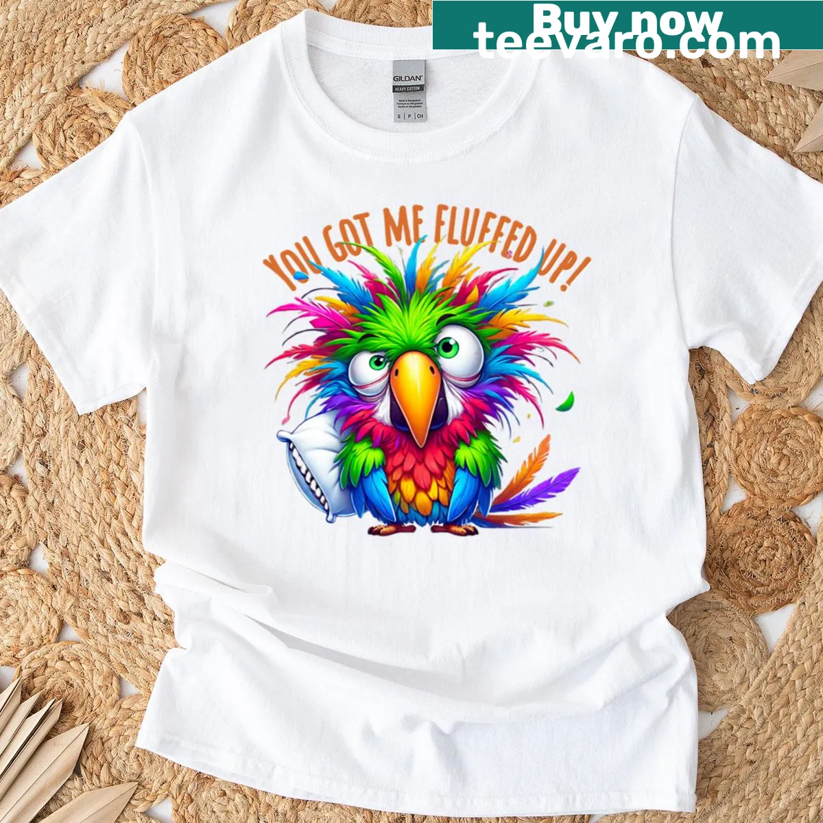 Oversized t-shirt with a cartoon angry rainbow parrot design. — on a men's t-shirt