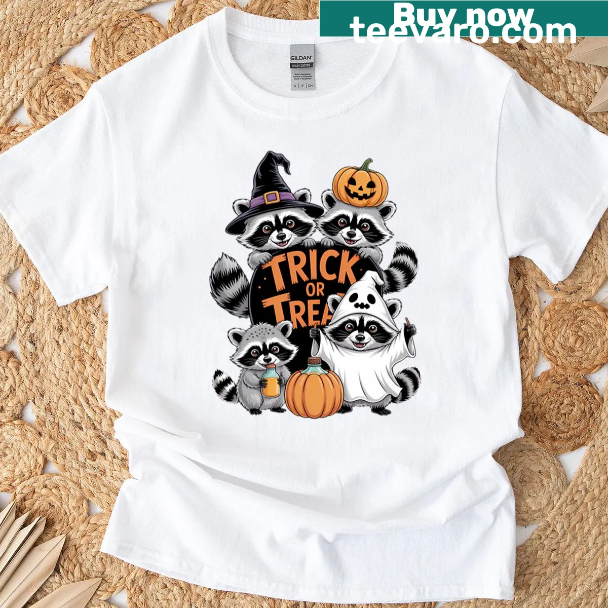 T-shirt featuring ghost raccoon and pumpkin Halloween art — on a men's t-shirt