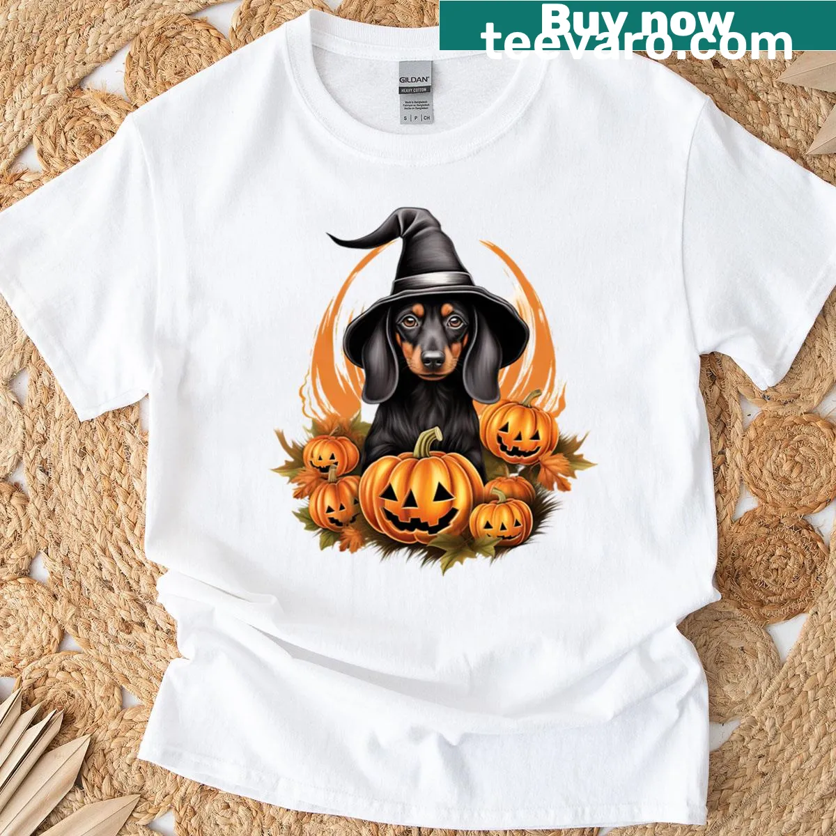 Halloween Doberman puppy in a witch costume graphic t-shirt — on a men's t-shirt