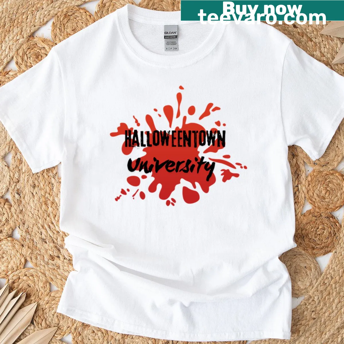 Playful Halloween Town University T-shirt with whimsical logo — on a men's t-shirt