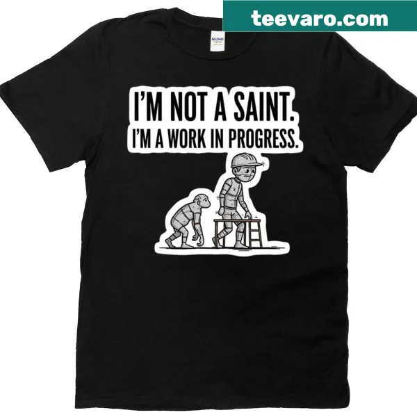 T-shirt featuring 'I'm Not A Saint, I'm A Work In Progress' statement in a fun font.