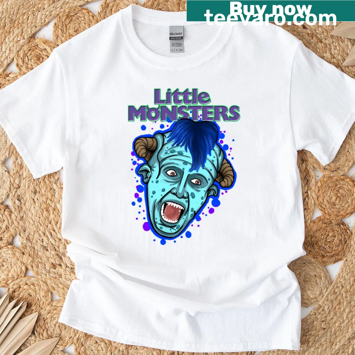 Whimsical t-shirt with playful little monster illustrations — on a men's t-shirt