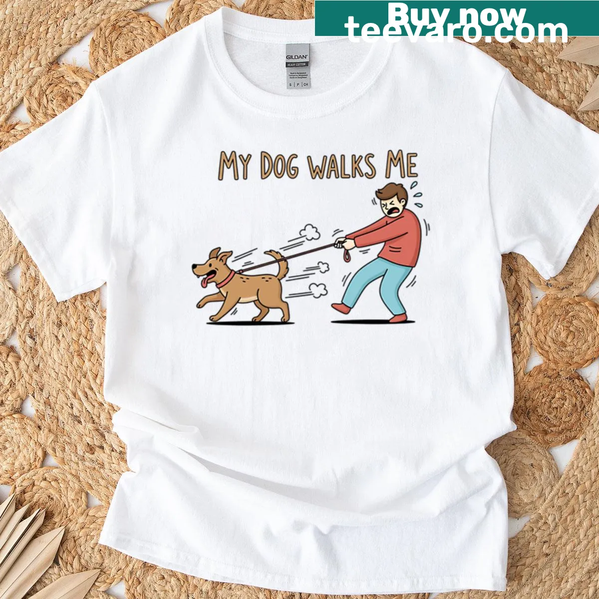 Cartoon design shirt featuring a dog leading its owner on a walk with humorous text — on a men's t-shirt