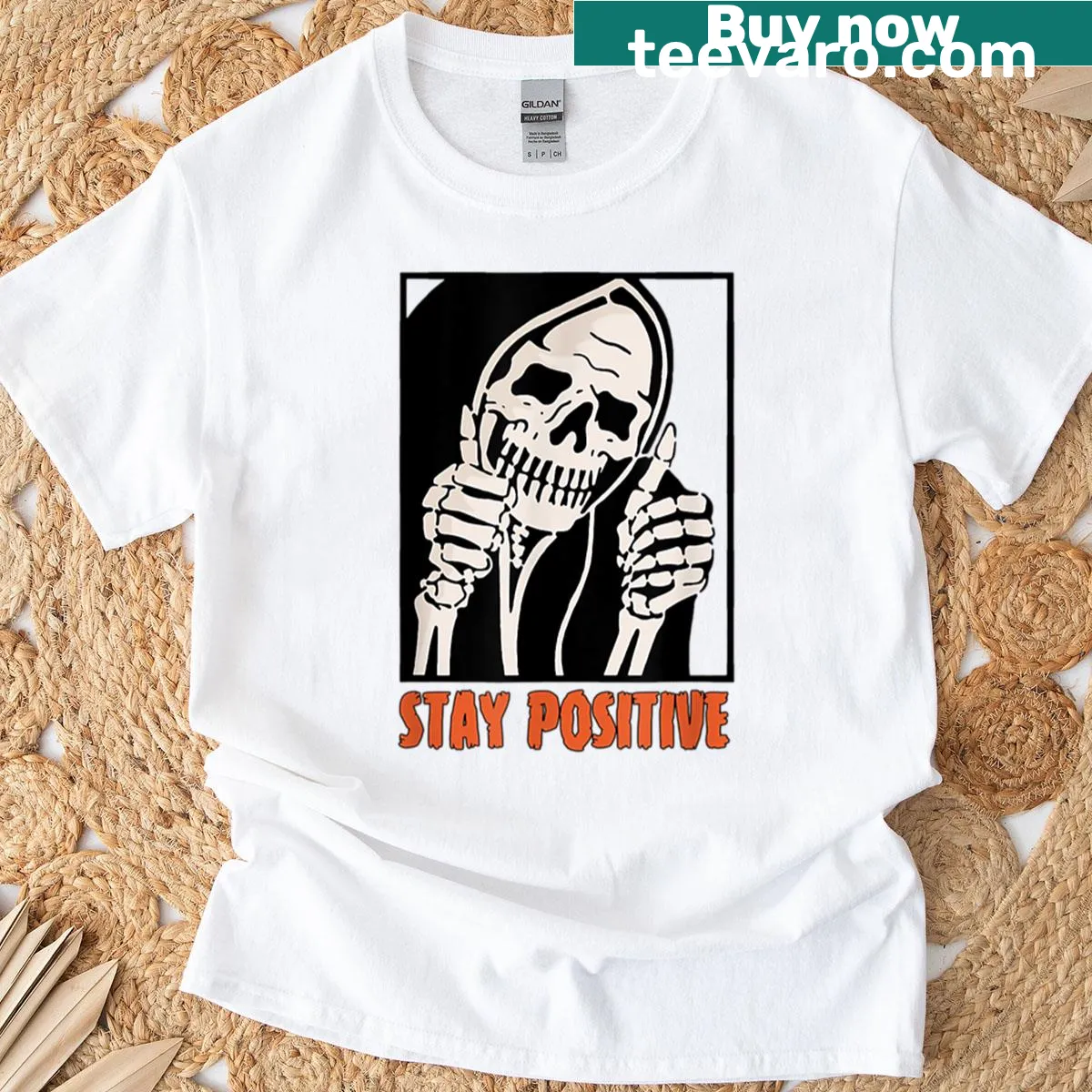 Skeleton thumbs up graphic on a playful Halloween T-shirt — on a men's t-shirt