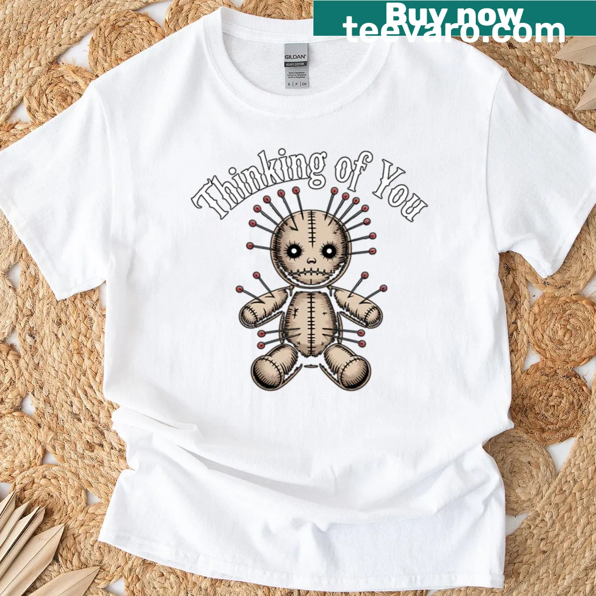 Dark humor voodoo doll graphic on a playful T-shirt — on a men's t-shirt