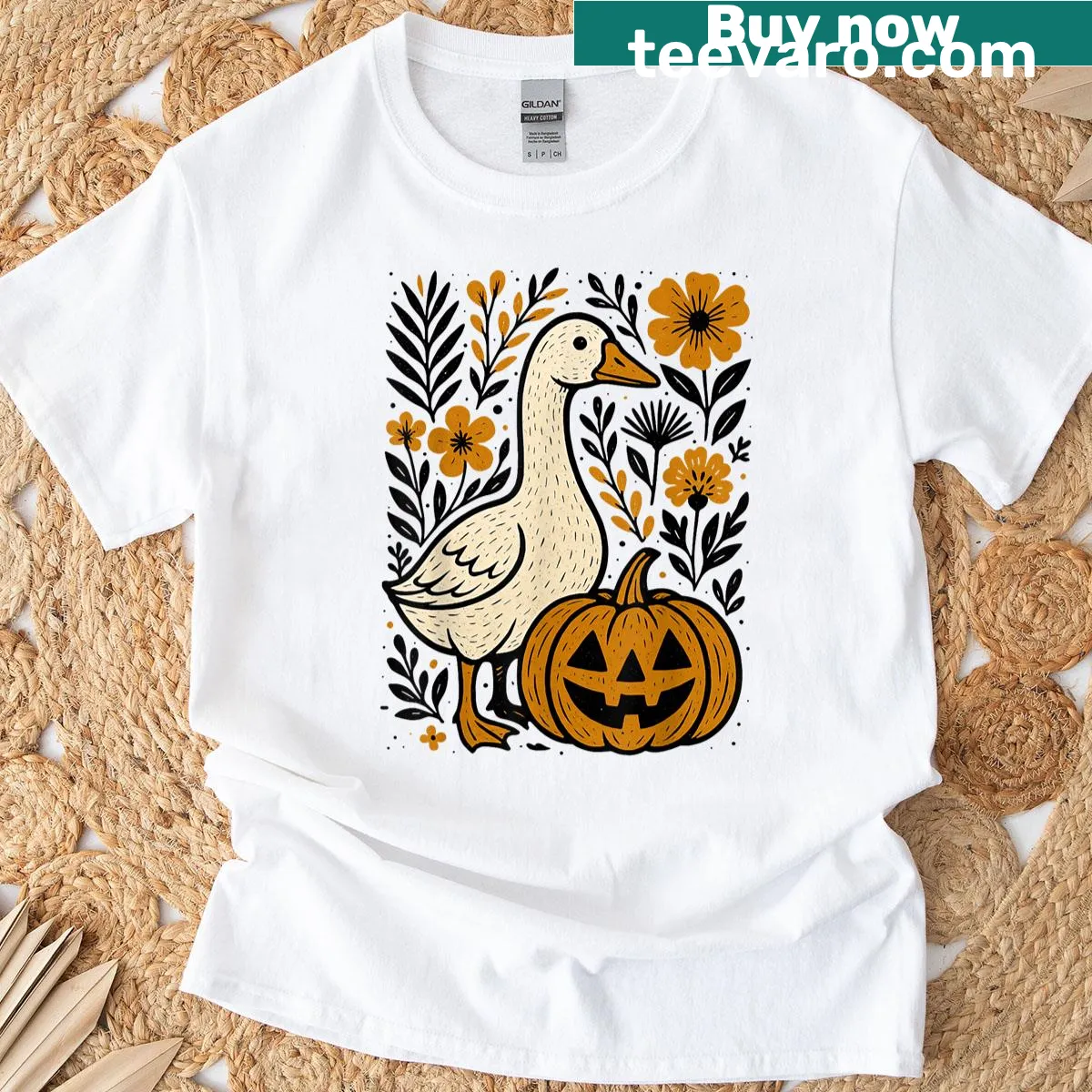 Boho style T-shirt with a whimsical pumpkin and silly goose design for fall — on a men's t-shirt