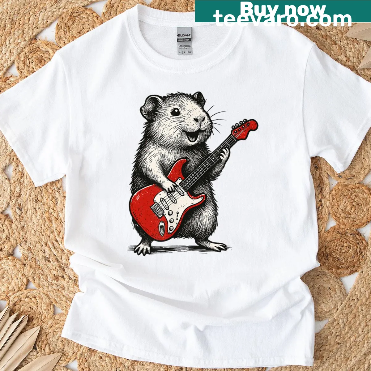 Vintage guinea pig playing guitar graphic on T-shirt — on a men's t-shirt