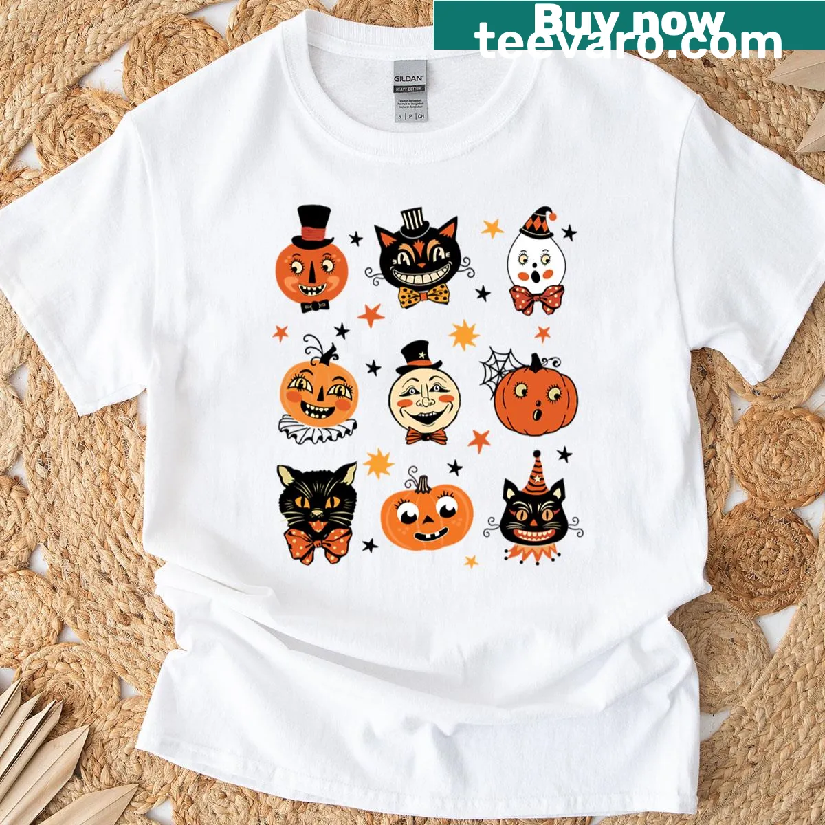 Halloween-themed t-shirt with pumpkins and cats pattern — on a men's t-shirt