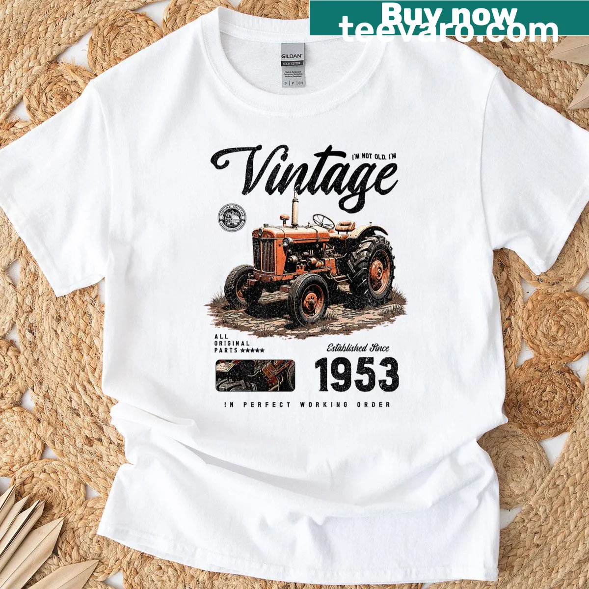 Vintage tractor T-shirt celebrating a farmer born in 1953 — on a men's t-shirt