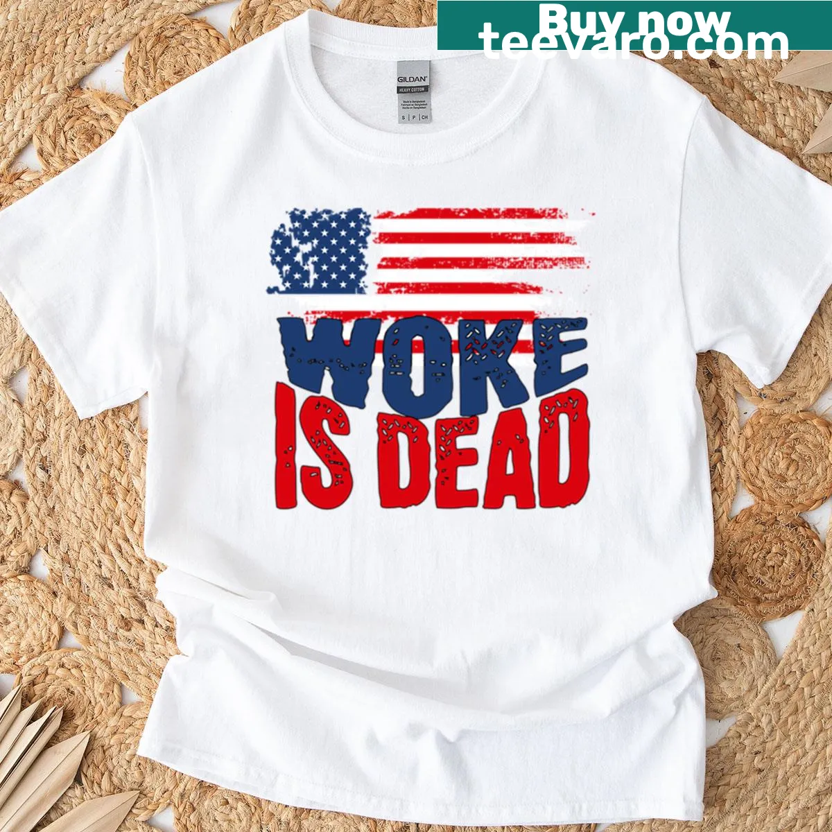 Woke Is Dead t-shirt featuring a bold sarcastic slogan — on a men's t-shirt