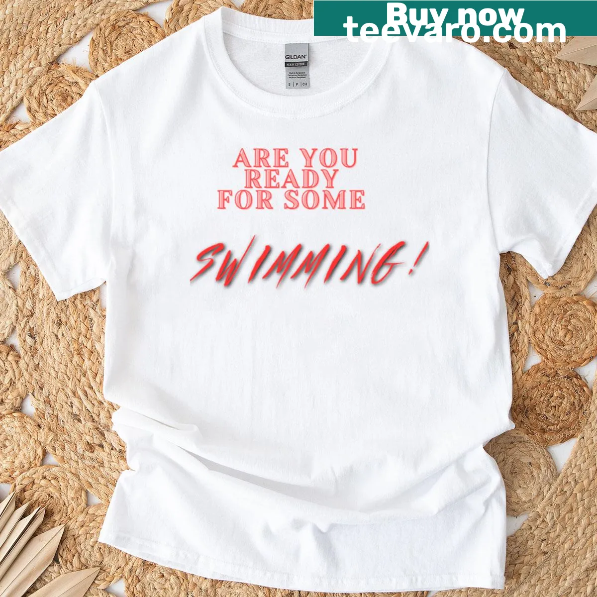 Playful swimming-themed typography on t-shirt — on a men's t-shirt