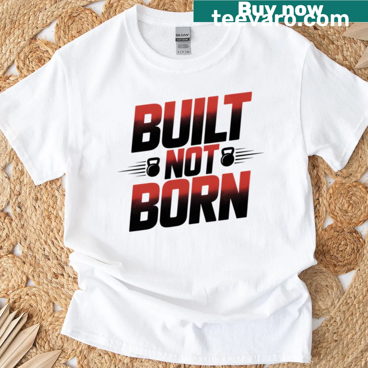 Oversized t-shirt featuring the phrase 'Built Not Born' in bold typography. — on a men's t-shirt