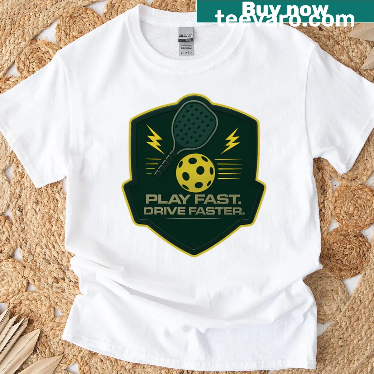 Oversized T-shirt with pickleball paddle and lightning design — on a men's t-shirt