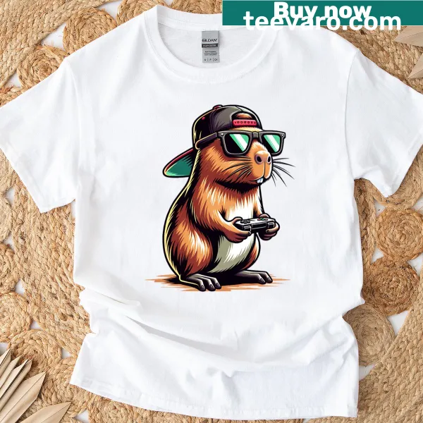 Funny T-shirt featuring a cool capybara playing video games
