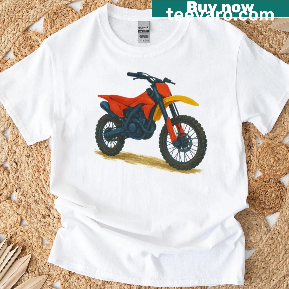 Hand-painted dirt bike illustration on a T-shirt representing off-road energy — on a men's t-shirt
