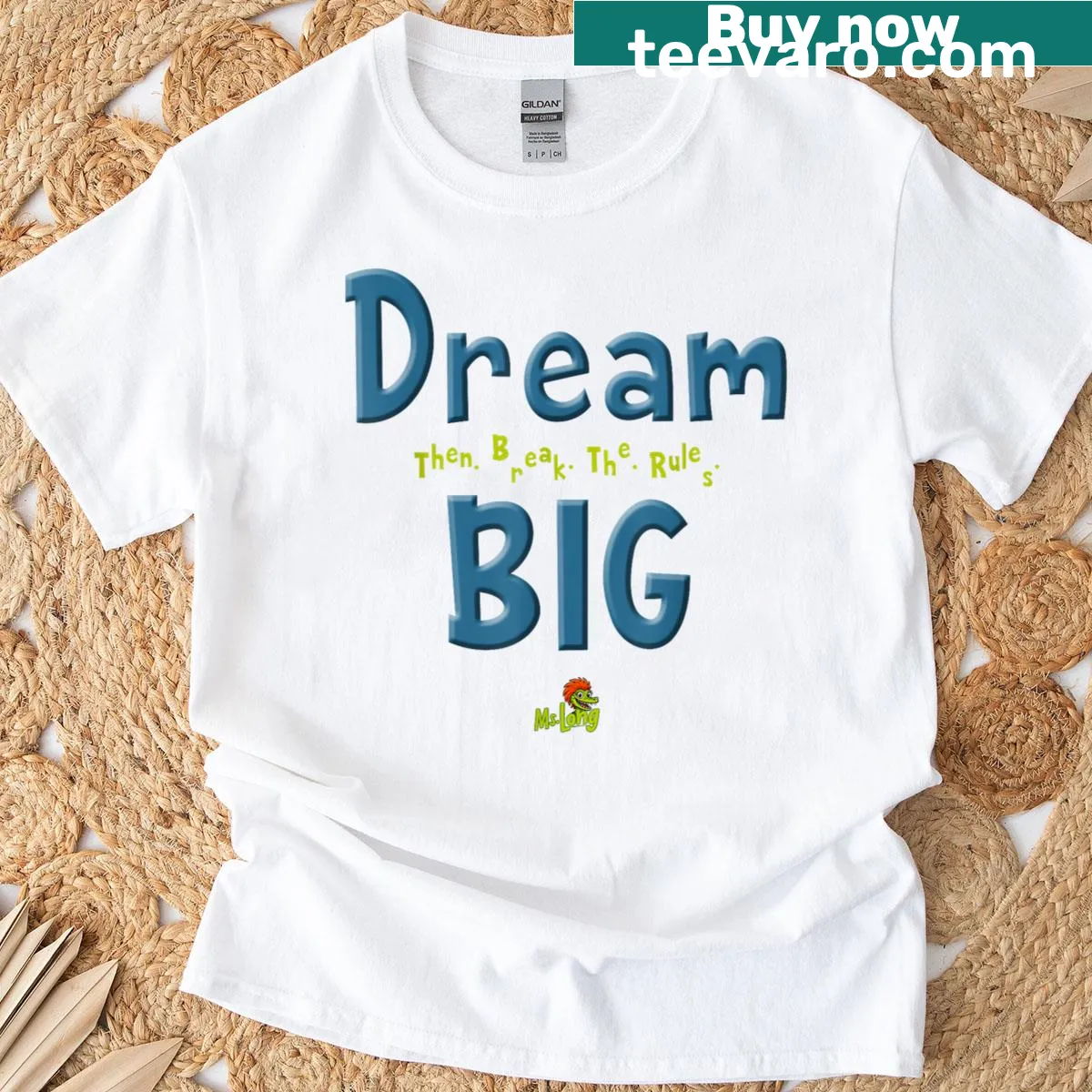 Bold typography T-shirt with the saying Dream Big Break Rules — on a men's t-shirt