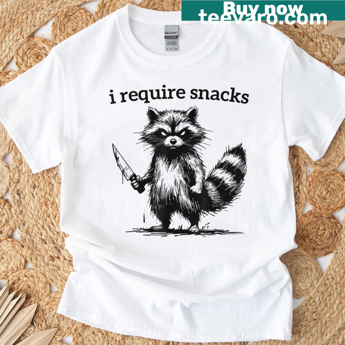 Funny t-shirt with a raccoon and the phrase 'I Require Snacks' — on a men's t-shirt
