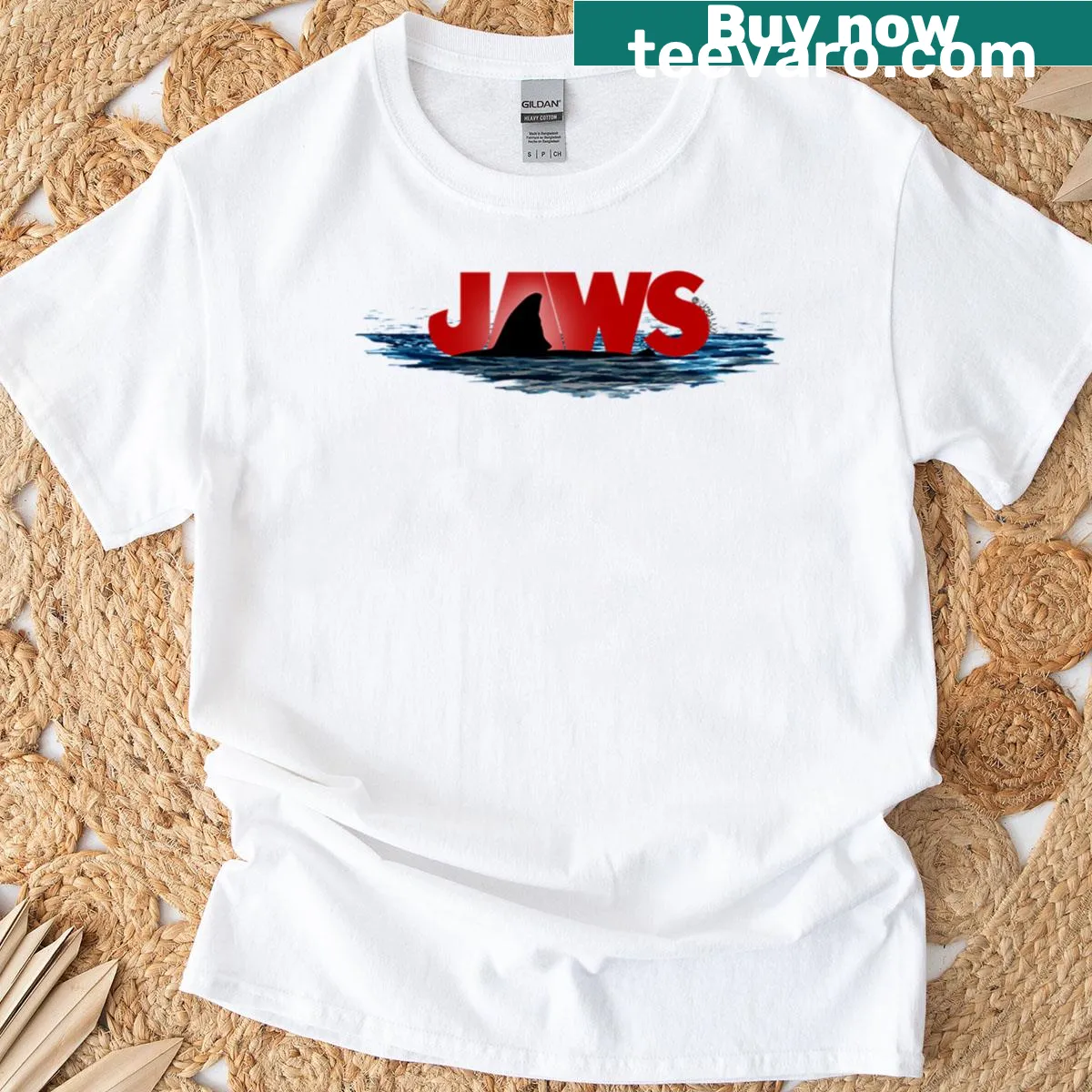 Jaws logo with Great White Shark fin graphic — on a men's t-shirt