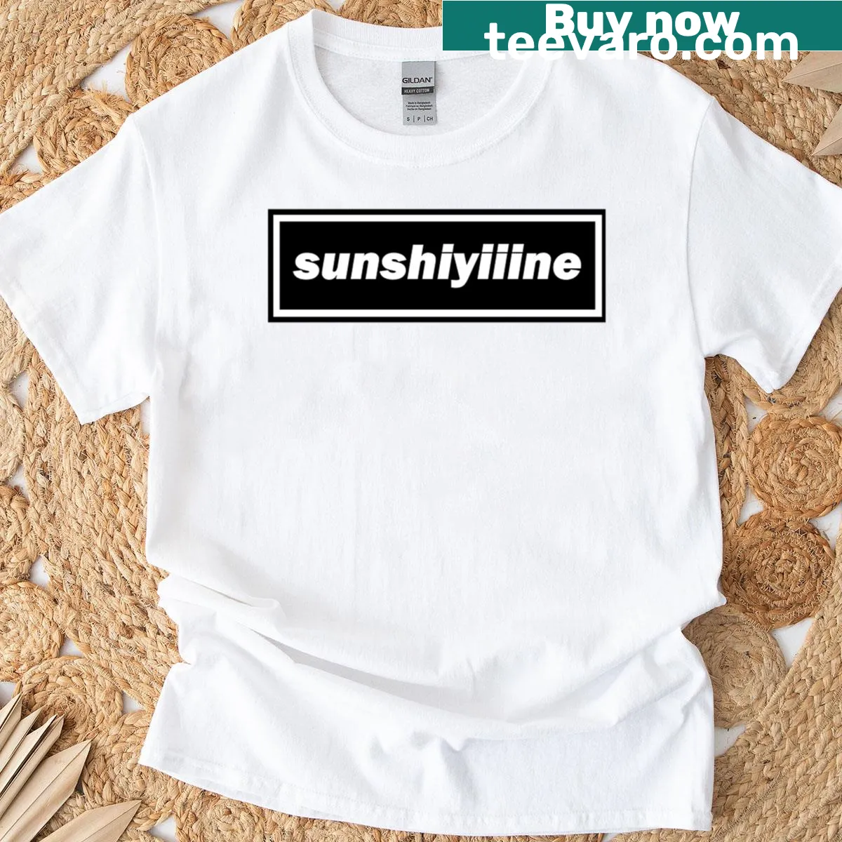 Oasis Sunshiyiiine logo T-shirt featuring a badge design — on a men's t-shirt