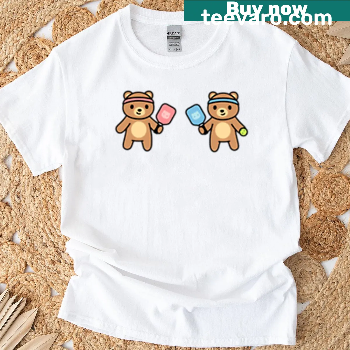 Oversized tee featuring playful bears playing pickleball in a fun illustration. — on a men's t-shirt