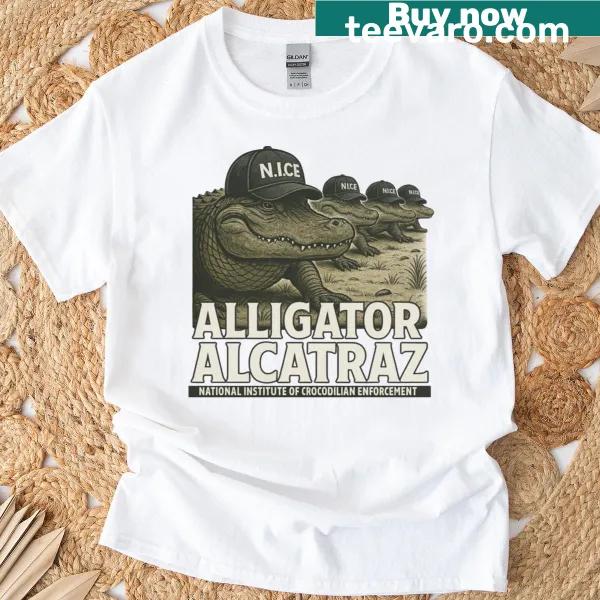 Vintage-style T-shirt with cartoon alligator and Gator Enforcement graphic.