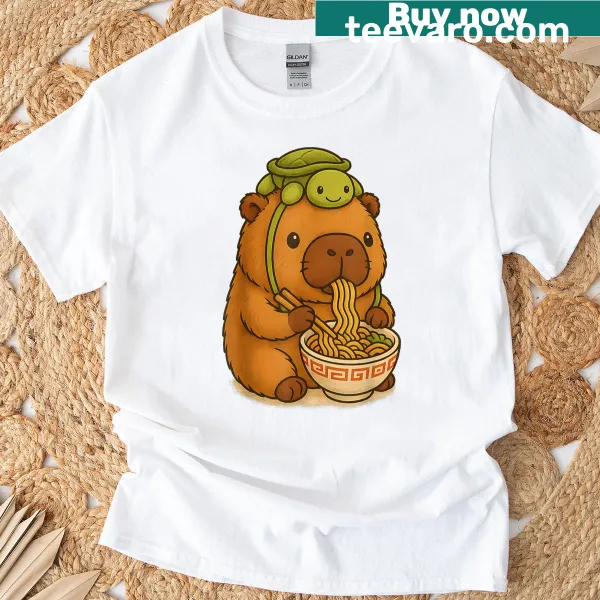 Kawaii graphic t-shirt with a capybara and turtle enjoying ramen.