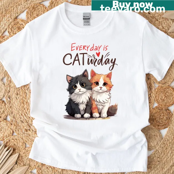 Cute cat-themed t-shirt with 'Every Day Is A Caturday' text
