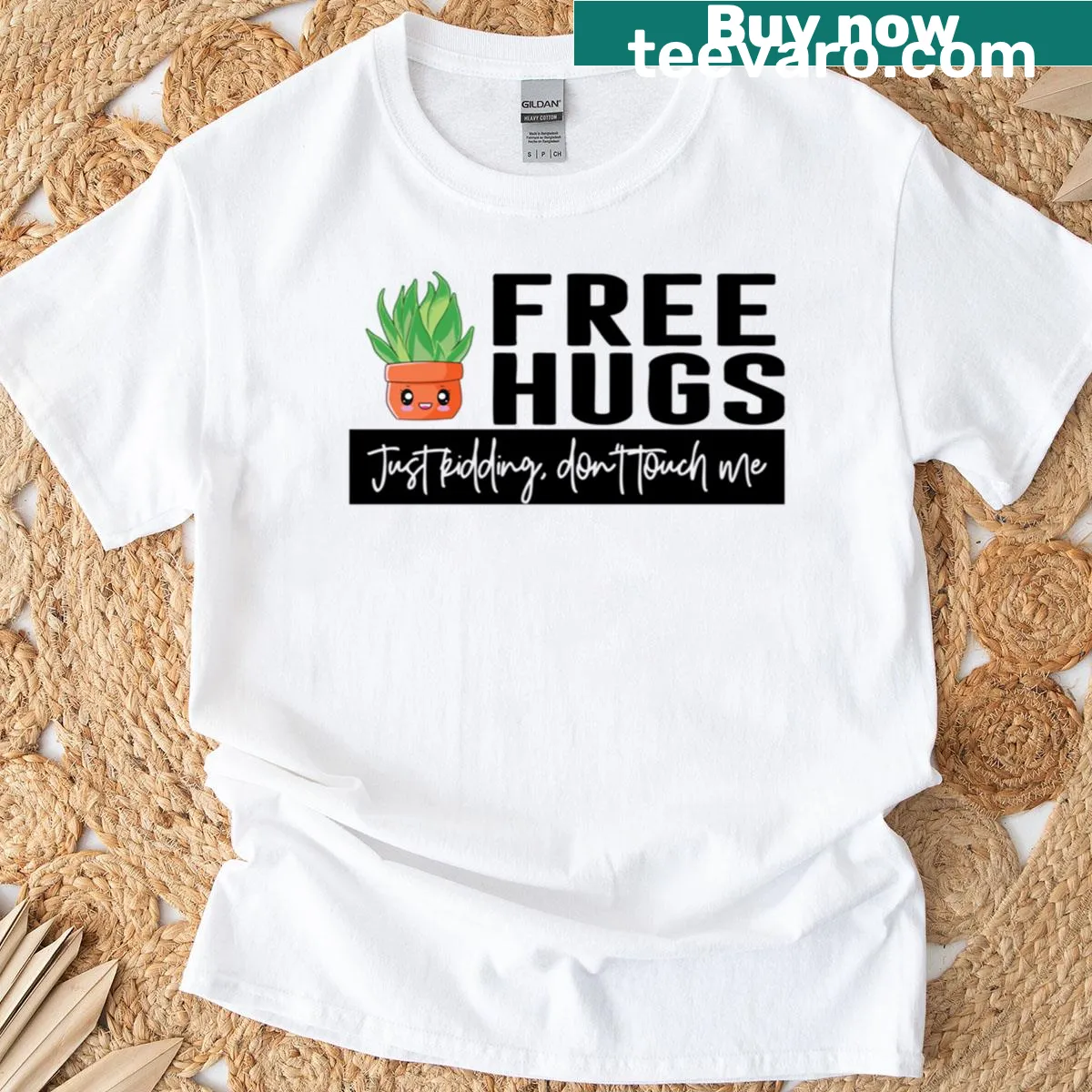 Sarcastic T-shirt with 'Free Hugs Just Kidding' text — on a men's t-shirt