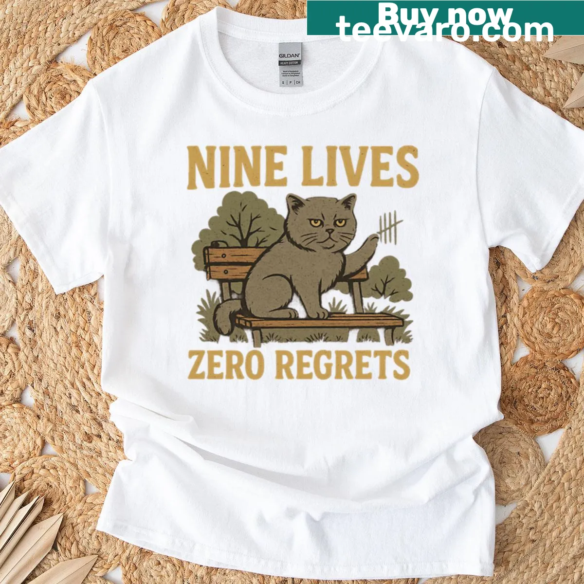 Vintage-style T-shirt with 'Nine Lives Zero Regrets' for cat lovers. — on a men's t-shirt