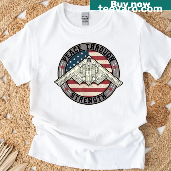 Distressed American flag graphic with the text 'Peace Through Strength' on t-shirt
