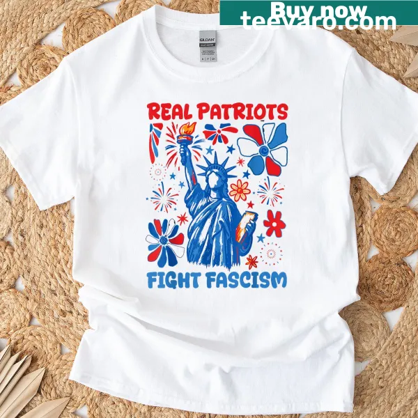 Floral design T-shirt with 'Real Patriots Fight Fascism' for political protests.