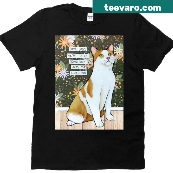 Hand-drawn cat artwork on a shirt for cat lovers.