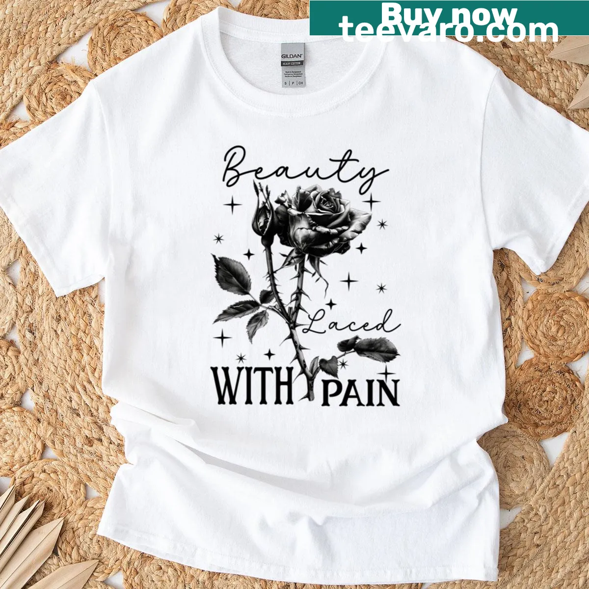 Vintage distressed t-shirt featuring a thorned rose and skulls design — on a men's t-shirt