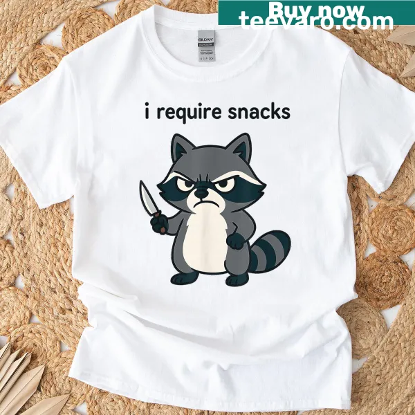 Funny graphic T-shirt with a raccoon and text I Require Snacks