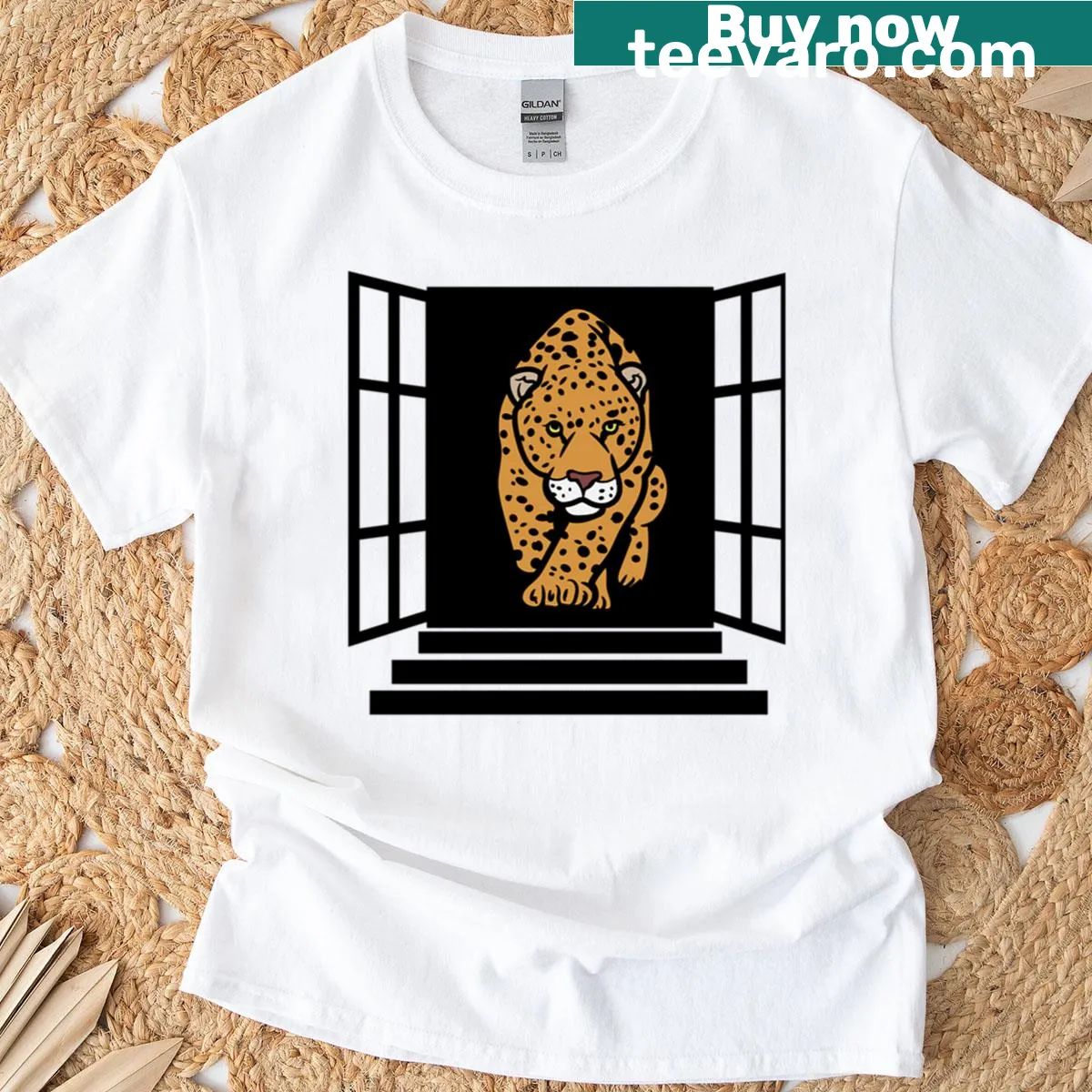 Illustrated T-shirt featuring a jaguar looking through a window — on a men's t-shirt