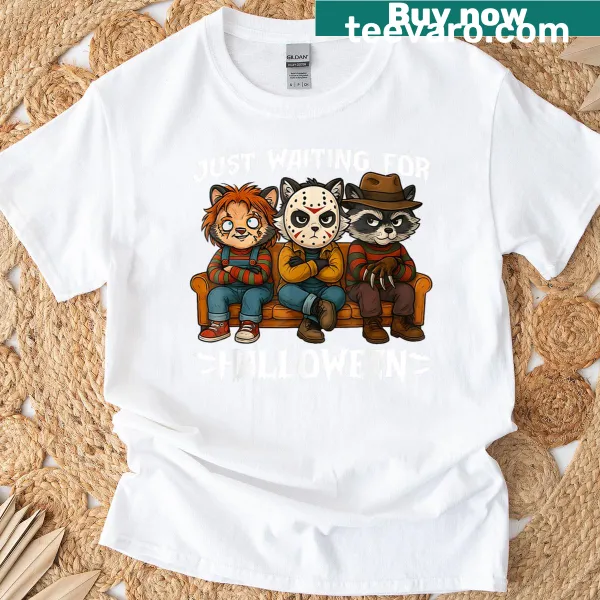 Halloween-themed t-shirt with a playful raccoon illustration