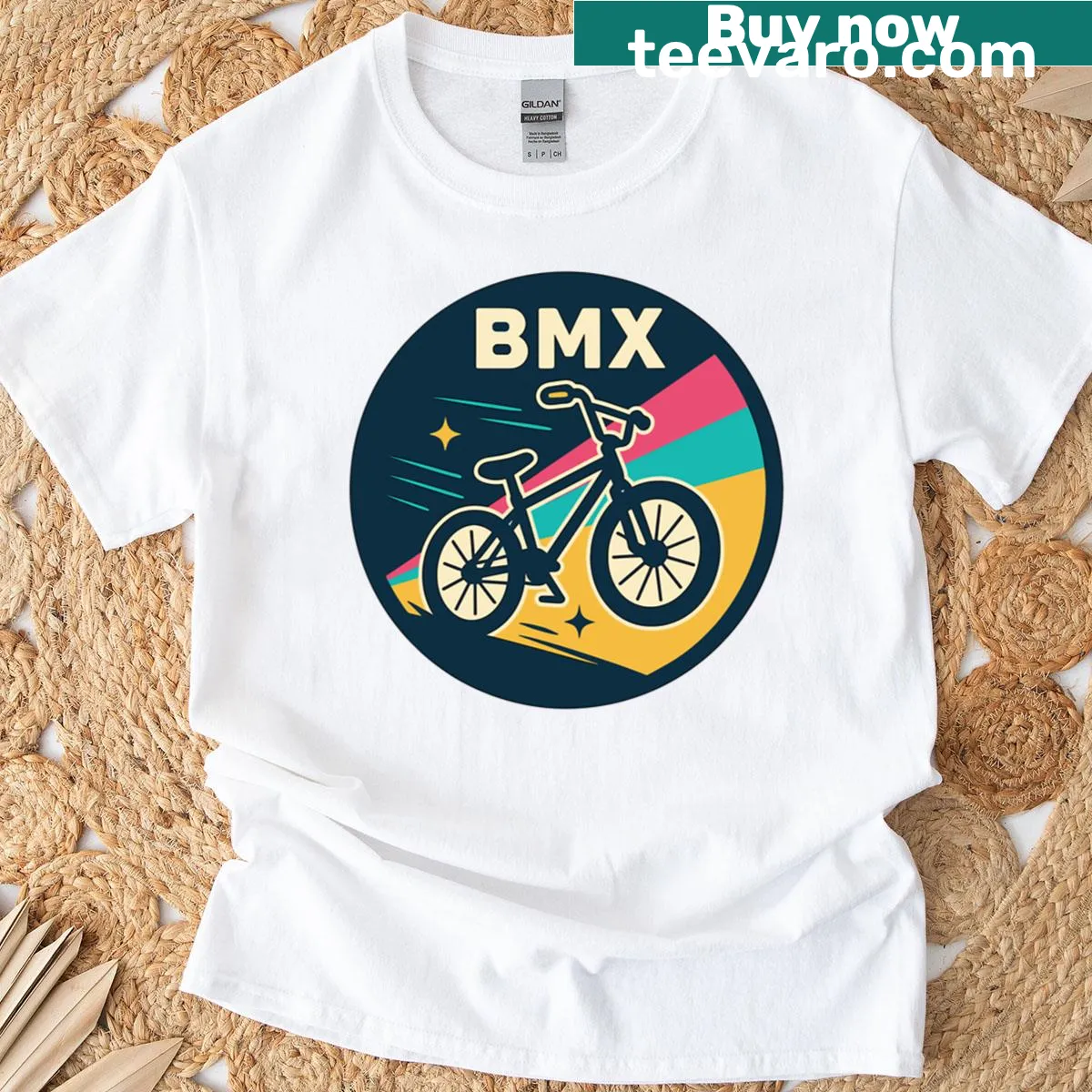 BMX trickster graphic on T-shirt, featuring dynamic vector design and retro elements. — on a men's t-shirt