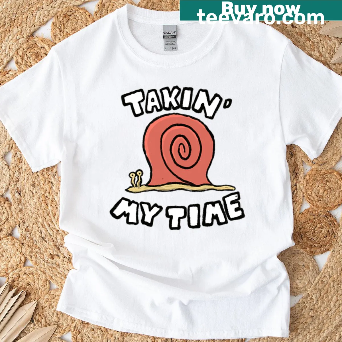 Cartoon snail illustration on a relaxed T-shirt design — on a men's t-shirt