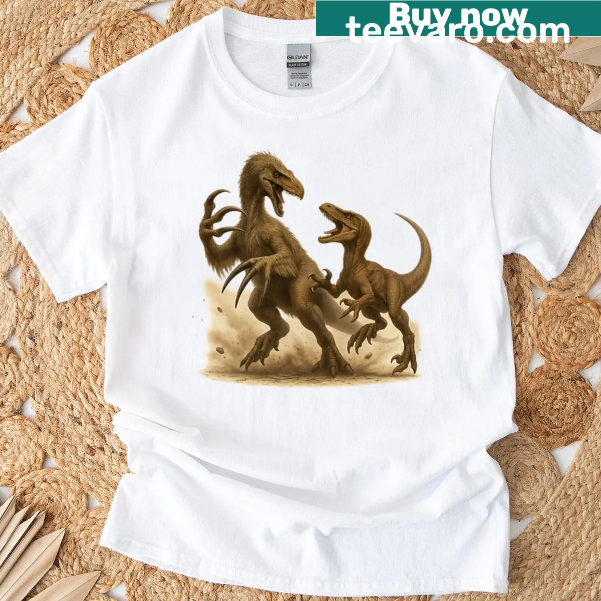 Dinosaur showdown illustration featuring Therizinosaurus and Raptor on a T-shirt. — on a men's t-shirt