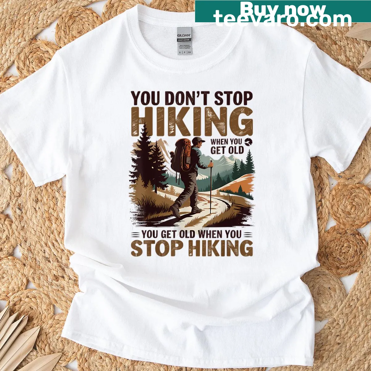 Motivational hiking T-shirt with bold typography — on a men's t-shirt
