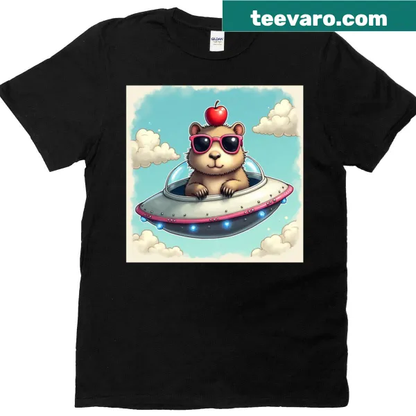 Funny t-shirt with a capybara in sunglasses inside a UFO
