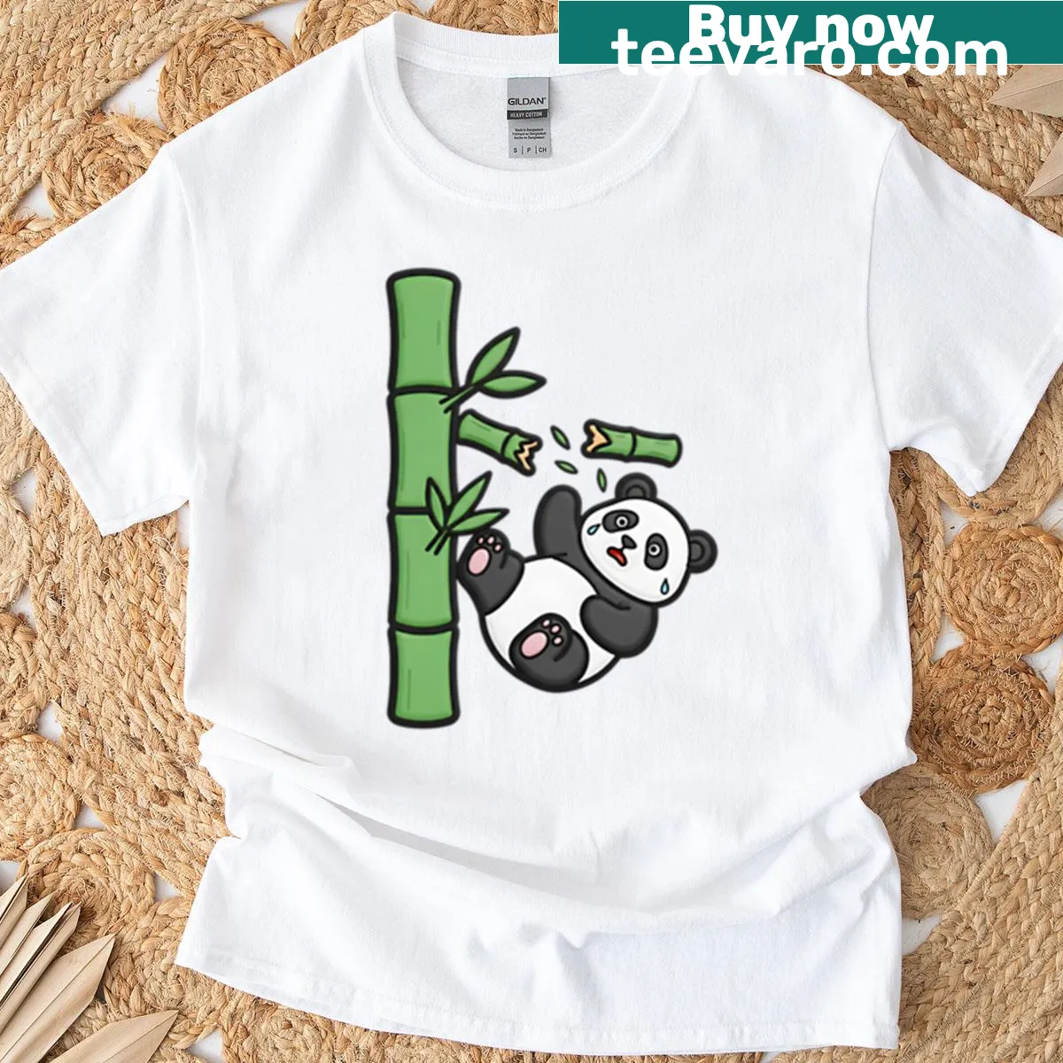 Cartoon graphic of a cute panda falling from a bamboo tree — on a men's t-shirt