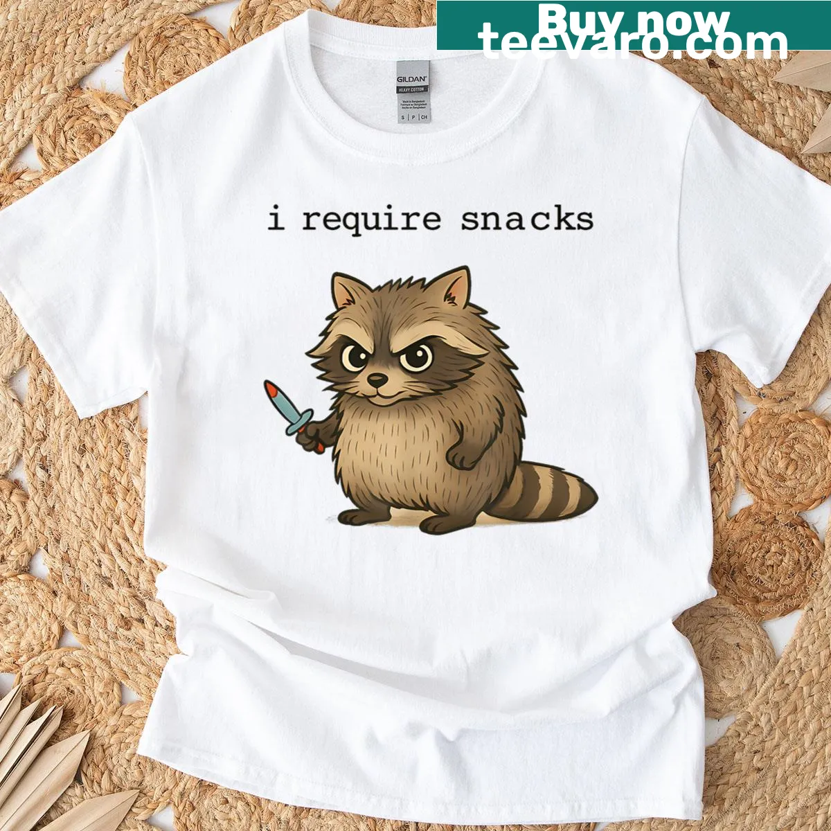 Funny raccoon t-shirt with the phrase 'I Require Snacks' and cartoon design — on a men's t-shirt
